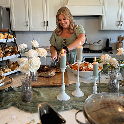 Jessica cooking or designing a tablescape