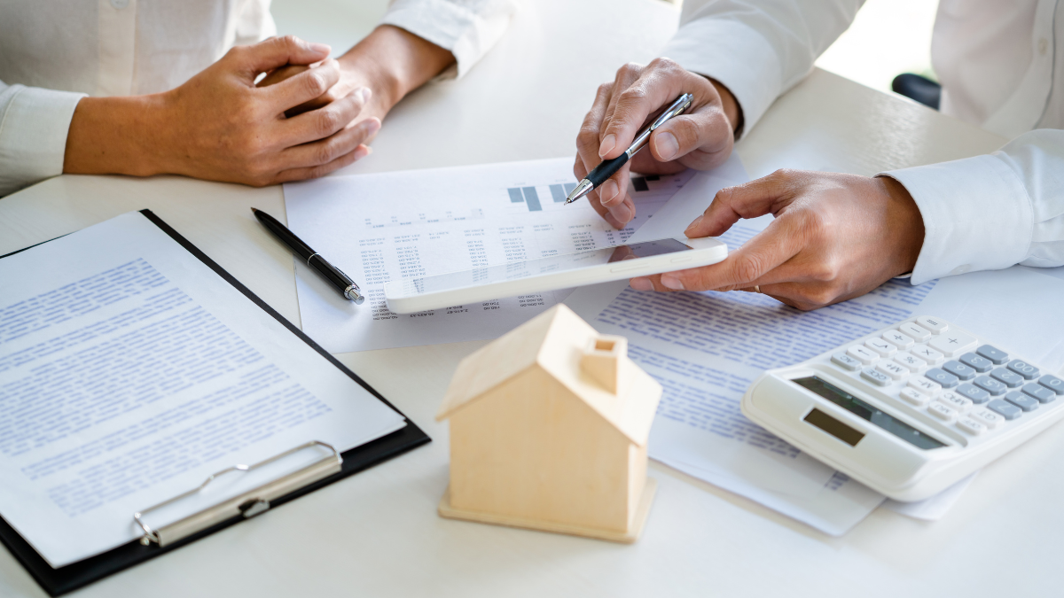 Two people reviewing home financing options